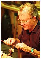 Jim putting finishing touch to rod