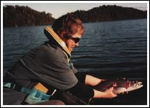 Karen holding 2,5 pound cutthroat New Zealand