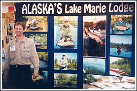 John Wilson at Alaska's Lake Marie Lodge booth, ISE Expo