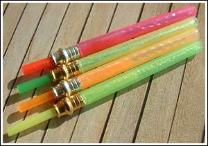 Coloured tubes with flash inside. Photo by Jurij Shumakov
